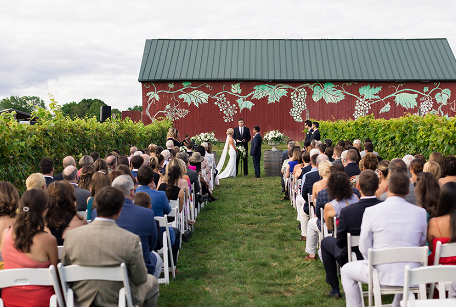 taking their vows in front of the barn